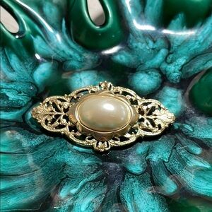 Gold and Cream Pearlescent Oval Brooch with Filigree Design
